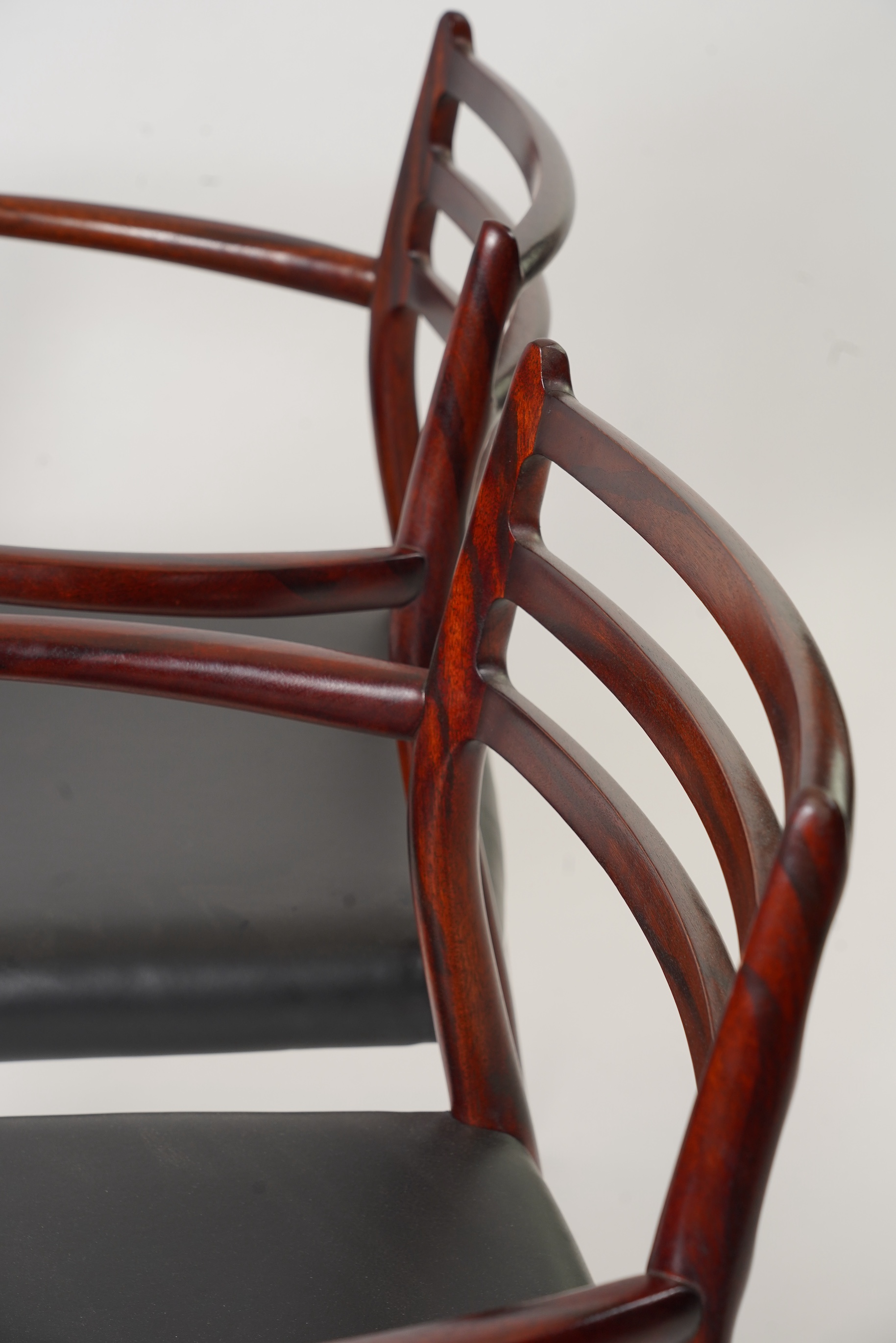 Niels Otto Møller (Danish, 1920-1982) for JL Møllers Møbelfabrik: A pair of 'Model 62' carver chairs